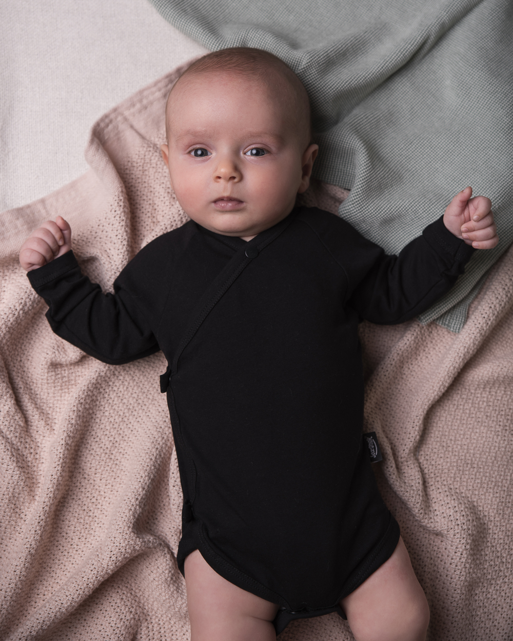 Infant wrapover onesie, black