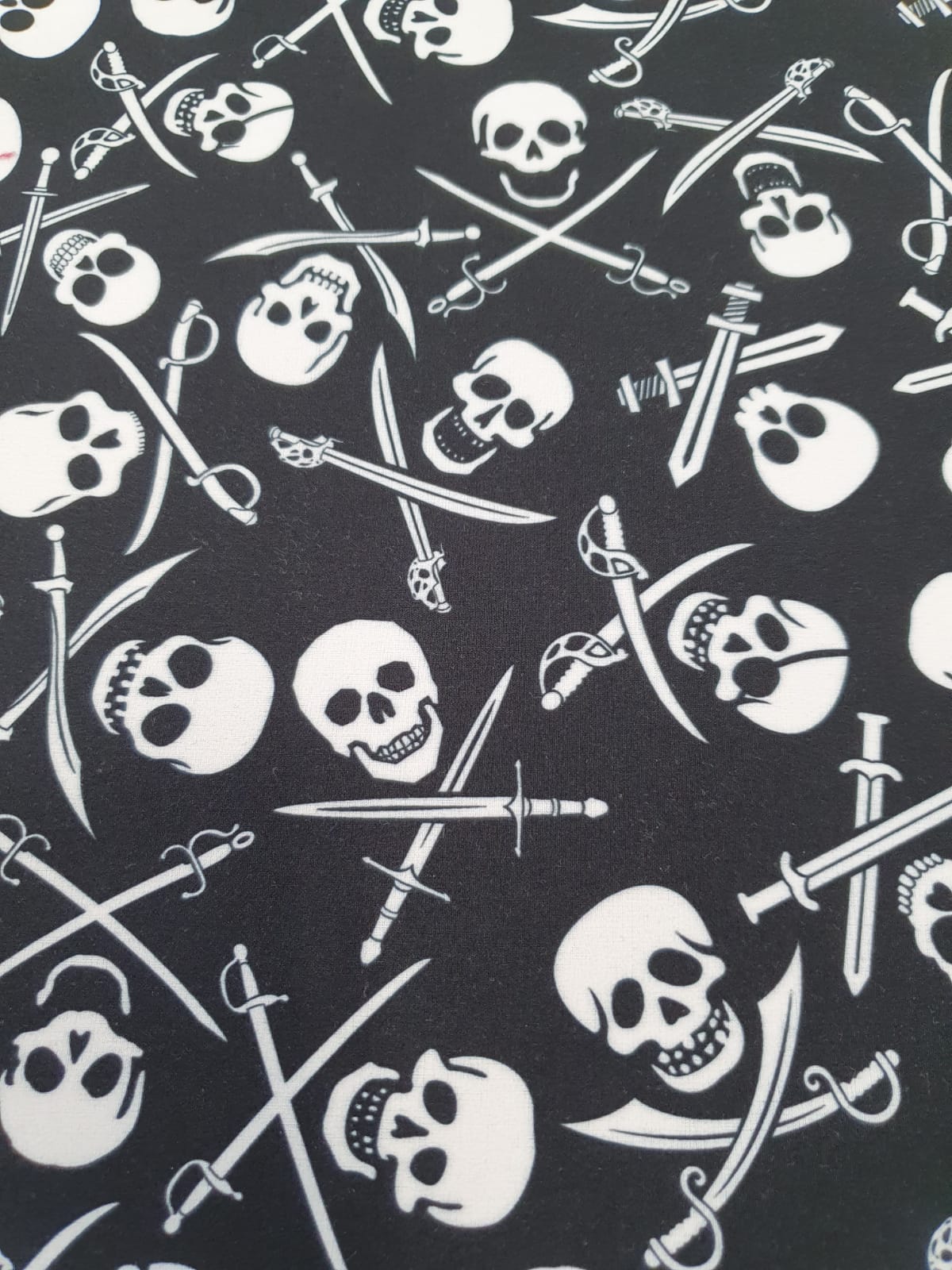 Winter softshell with fleece, 1 meter, printed pirate skulls
