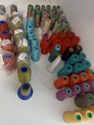 Polyester threads - various, leftovers from production, large spools